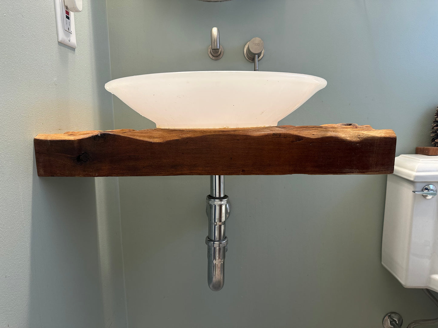 Organic floating vanity for a natural design